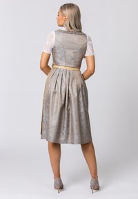 Light gray dress with a pleated skirt and embossed floral pattern, featuring a fitted bodice, lace sleeves, and a gold ribbon accent.