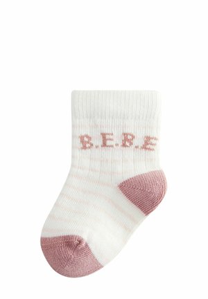 Białe i różowe skarpetki dla małych dzieci w paski, z prążkowanym mankietem, z napisem "B.E.B.E." w jasnoróżowym kolorze z boku. Materiał z mieszanki bawełny.