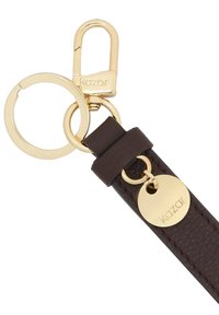 Une sangle de porte-clés en cuir marron avec des accessoires en or, dotée d'un clip et d'une étiquette circulaire embossée avec "kazar". Détails de surface texturée visibles.