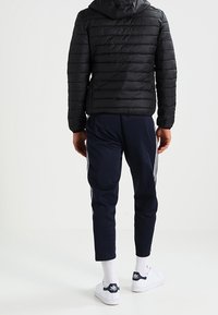 Ellesse Giacca da mezza stagione - black