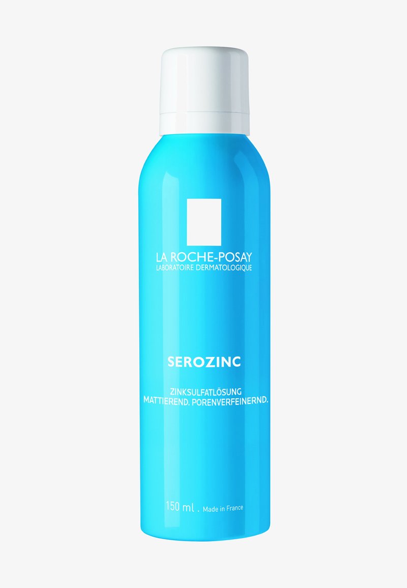 Blue cylindrical bottle of La Roche-Posay Serozinc spray with white cap, 150 ml, zinc sulfate solution for mattifying and refining pores.