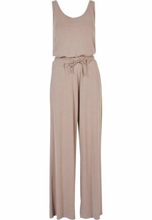 Beige jumpsuit med scoop-udskæring, ærmeløs design, elastisk talje med bånddetalje og vide benbukser for en afslappet pasform.