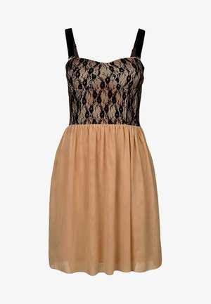 Cuerpo de encaje negro con escote en forma de corazón, tirantes ajustables y falda plisada de color nude hecha de tela ligera.