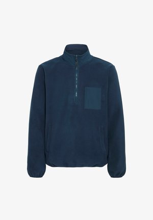 Tumedatest sinisest fliispullist kõrgema krae, poole tõmblukuga ees ja rinna taskuga. Elastsed mansetid ja äär võimaldavad hea sobivuse. Pehme tekstuur.