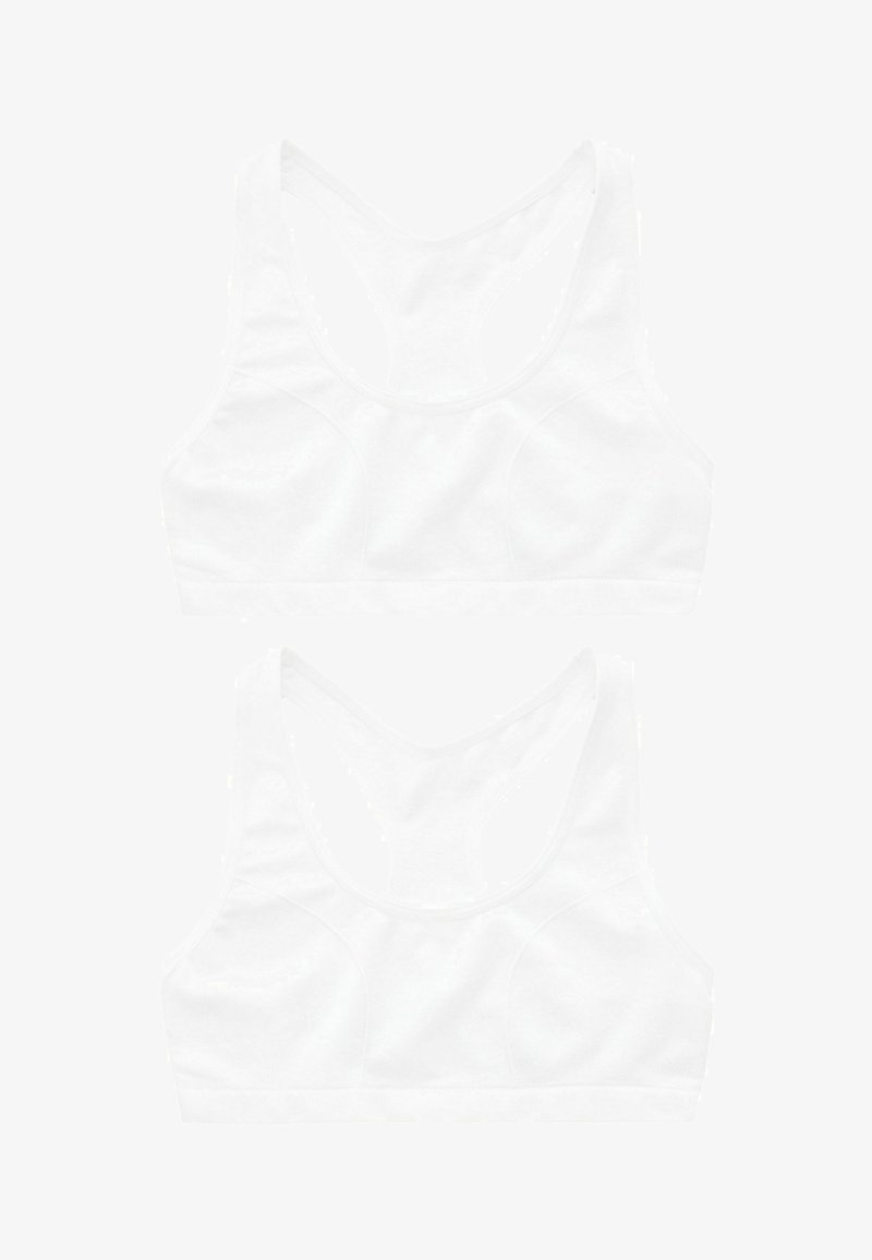 Białe sportowe biustonosze z konstrukcją w stylu racerback, wykonane z gładkiego materiału, z wyprofilowanymi szwami i bezszwowym paskiem na dole.
