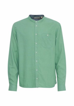 Light green long-sleeve shirt with a stand collar, front pocket, and button closure. Made from textured fabric.
