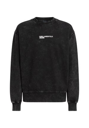Felpa nera realizzata in un misto cotone, con scollo rotondo, polsini a costine e logo "KARL LAGERFELD JEANS" bianco sul davanti.