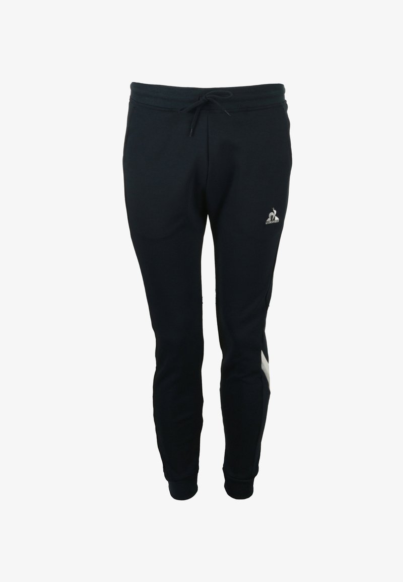 Donkerblauwe sweatpants van een katoenmix, met een elastische tailleband met trekkoord, aansluitende boorden en een klein logo aan de voorkant.