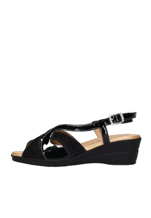 Sandali wedge neri con finitura lucida in vernice e cinture testurizzate nere. Caratterizzati da una chiusura a fibbia e una soletta imbottita per il comfort.