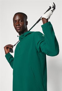 adidas Golf ULTIMATE365 - Neperpučiamoji striukė - green