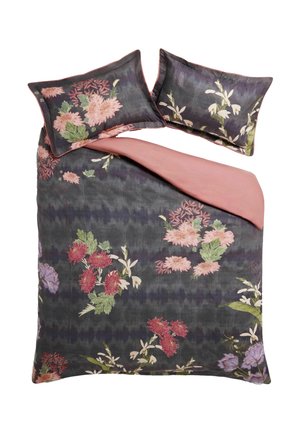 Dark gray floral duvet cover with pink, red, white, and purple flowers and matching pillows, partially folded back to show pink underside.