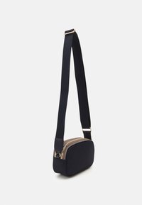 Tommy Hilfiger POPPY CAMERA BAG - Cross body bag - space blue
