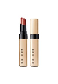 Leppestift i et gull- og svartrør, med en skrå, rødbrun kule. Merkenavnet "BOBBI BROWN" er trykt på forpakningen.