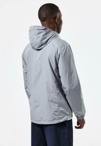 Lightweight gray hooded jacket with elastic cuffs and a relaxed fit. Made of textured fabric, features a simple design without visible logos.