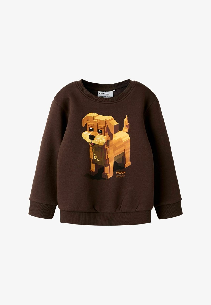 Brązowa bluza z pikselowym żółtym psem i napisem "WOOF". Posiada okrągły dekolt i ściągacze przy rękawach dla lepszego dopasowania.