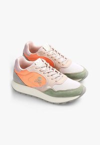 Light pink and green sneakers with gray accents, featuring an orange side panel and skull logo, textured fabric, and a cushioned sole.