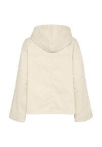 Veste beige à capuche avec manches longues vue de dos, avec coutures simples et un ourlet droit.