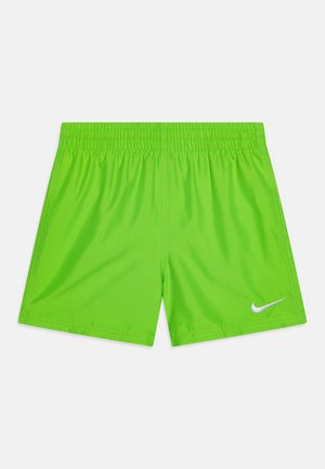 Pantaloni da nuoto Nike, verde brillante, con cintura elastica, materiale leggero, texture liscia, accentuazione del logo bianco sul lato sinistro in basso.