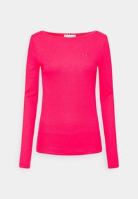 Langarmshirt in leuchtendem Pink, aus weichem Stoff gefertigt. Mit einem weiten Ausschnitt und einem kleinen Logo auf der Brust.