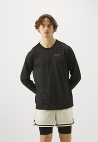Nike Performance TEE  - Pikkade varrukatega topp - black