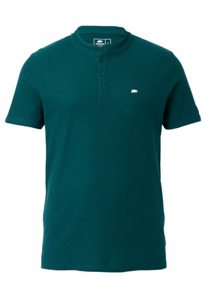 Polo shirt a maniche corte di colore teal realizzato in cotone a costine. Presenta un colletto alla coreana, una patta con tre bottoni e un piccolo logo a forma di orso sul lato sinistro del petto.