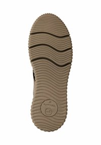 Rubber shoe sole in light brown with a textured wavy pattern, featuring a circular logo and a round label with the number 37.