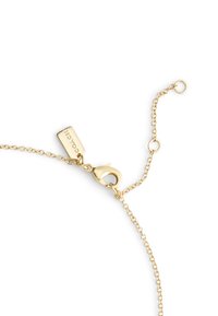 Gold chain bracelet with a lobster clasp. Features a tag engraved with the brand name, textured links, and a delicate adjustable chain.