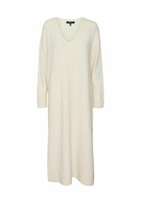Robe longue couleur crème à manches longues en tissu doux, avec un décolleté en V, une coupe décontractée et des poignets côtelés, atteignant la mi-mollet.