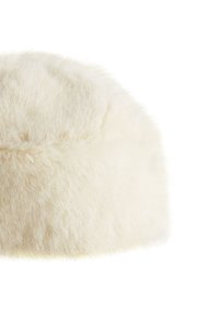 White fur hat with soft texture, rounded top, and a smooth finish. Features a subtle sheen and a wide band at the base.