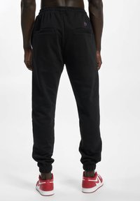 ecko unltd. Tracksuit bottoms - black