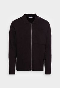 Svart zip-up kofta med krage, långa ärmar och en bröstficka. Tillverkad i ett mjukt, strukturerat tyg.