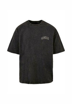 T-shirt in cotone nero con scollatura rotonda, maniche corte e logo ricamato sul lato sinistro del petto. Presenta una texture invecchiata e orlo grezzo.