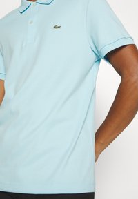 Lacoste Polokošeľa - agrion