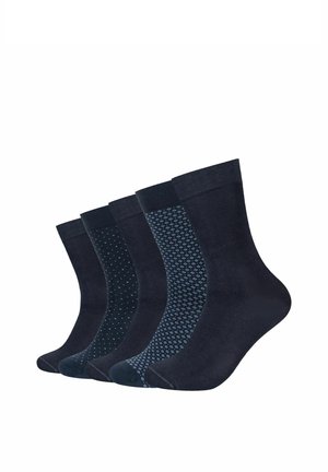 Five pairs of navy blue socks displayed in a row, including solid colors and two pairs with small dot and diamond patterns.