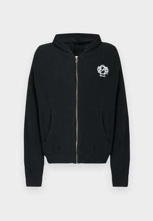 Black zip-up cardigan made of textured knit fabric, featuring two front pockets and a small embroidered logo on the left chest.