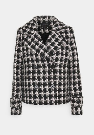 Veste croisée à motif pied-de-poule noir et blanc avec larges revers et poignets boutonnés, étiquetée "Forever New."