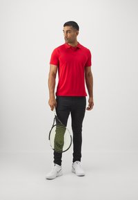 Björn Borg TRAINING PANTS - Pantalones deportivos - black beauty