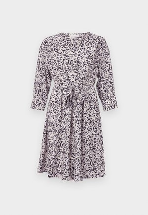 Vestido com padrão floral em cor clara com detalhes em azul-marinho, manga longa, frente abotoada e detalhe de cintura amarrada. Tecido suave e leve.