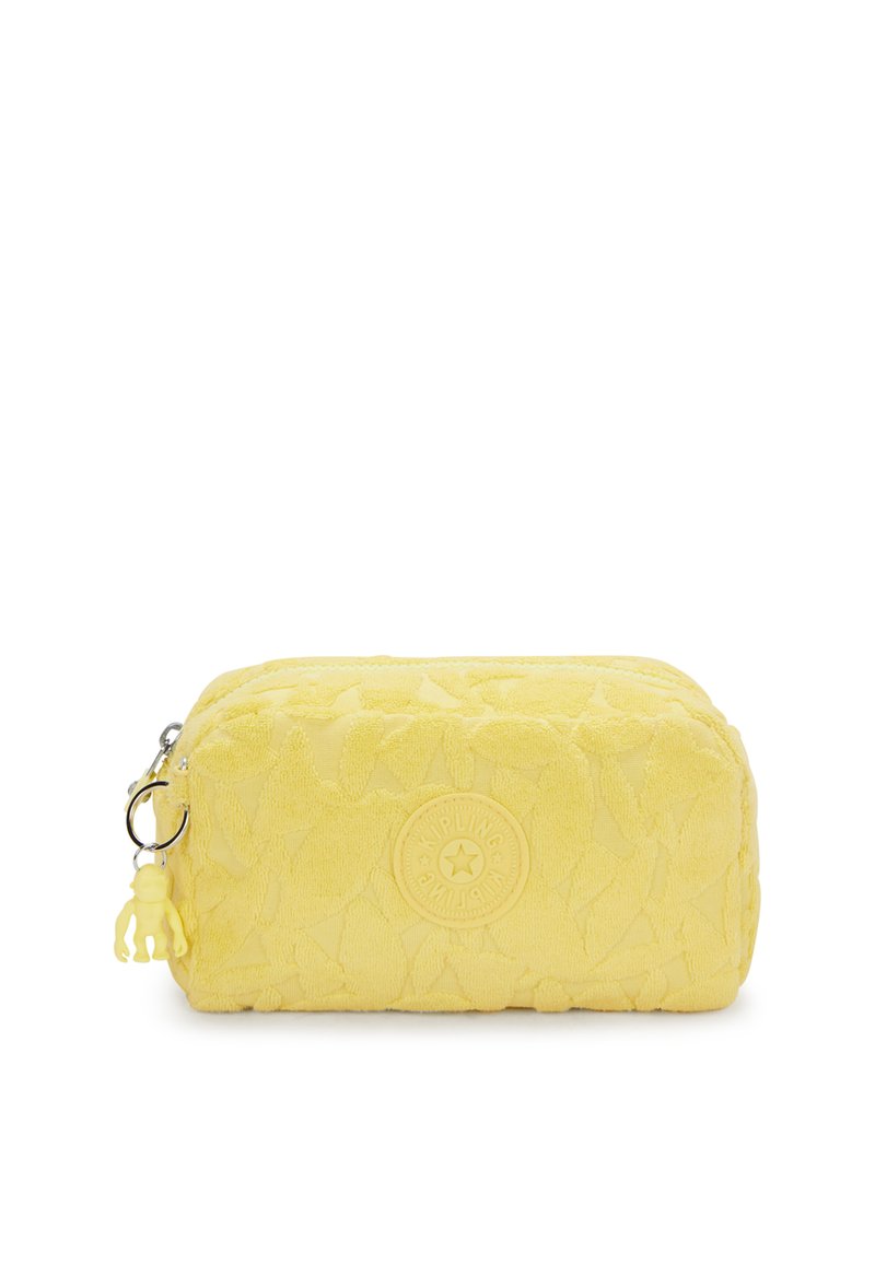 Keltas kosmetinis maišelis su tekstūruotu gėlių raštu, su užtrauktuku, sidabro spalvos detalėmis ir nuimamu beždžionių pakabuku.