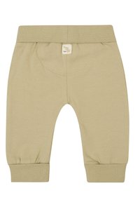 Helle beigen Baumwollhosen mit einem gerippten Bund und Bündchen, versehen mit einem kleinen Logo-Tag auf der Rückseite. Glatte Textur und einfaches Design.
