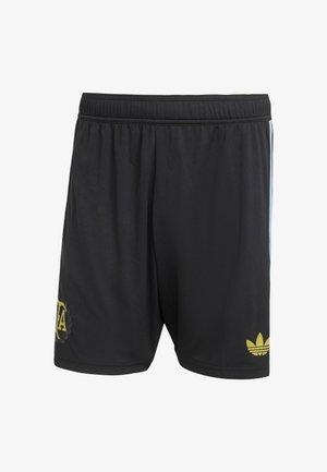 Zwarte sportkorte broek met een zachte textuur, voorzien van een goudkleurig logo op de linker dij en lichtblauwe accenten aan de zijkant. Elastische tailleband inbegrepen.