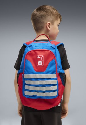Puma, PUMA X TRANSFORMERS KLEINER 13 L RUCKSACK UNISEX - Schooltas - racing blue-for all time red
