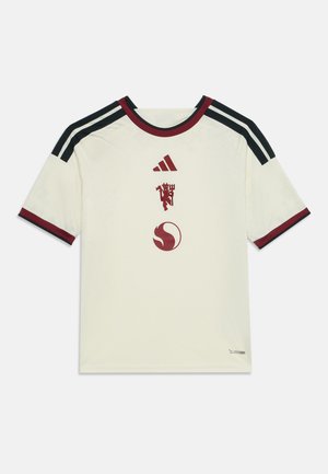 Cremefarvet fodboldtrøje med sorte skulderstriber, bordeaux krave og kant på ærmerne samt tre bordeaux logoer foran i midten.