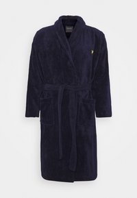 Accappatoio blu navy realizzato in tessuto peluche, con colletto a scialle, due tasche frontali e una cintura coordinata. Logo giallo in evidenza sul petto.