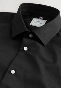 Unselected, mottled black