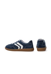 Navy blue suede sneakers with white stripes, rubber sole, round toe, and lace-up design. Features contrasting stitching and a cushioned interior.