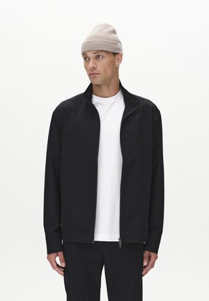 NIK TECH - Light jacket - black
