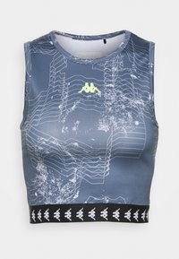 Blue crop top made of stretchy fabric, featuring a geometric white pattern, rounded neckline, and a black band with a logo along the bottom.