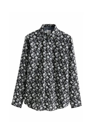 Zwart lang mouwen shirt met een wit bloemenpatroon, knopen aan de voorkant en een omgeslagen kraag. Soepele stoftextuur en een losse pasvorm.