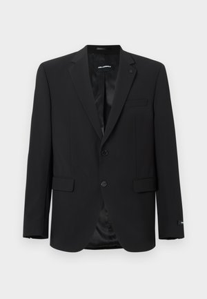 Must-valged bleiser, millel on nurga-lapelsed, kaks esimest klapp-taskut, üks rinna-tasku ja kahe nööbi kinnitamine, esitatud valgel taustal.